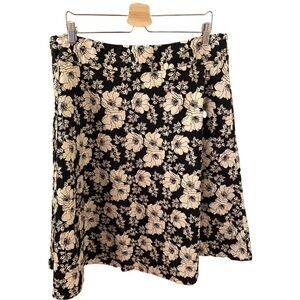 GAP A-line skirt. Size 16. Black and cream floral pattern. Side-zipper.